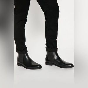 Black faux leather dress shoes